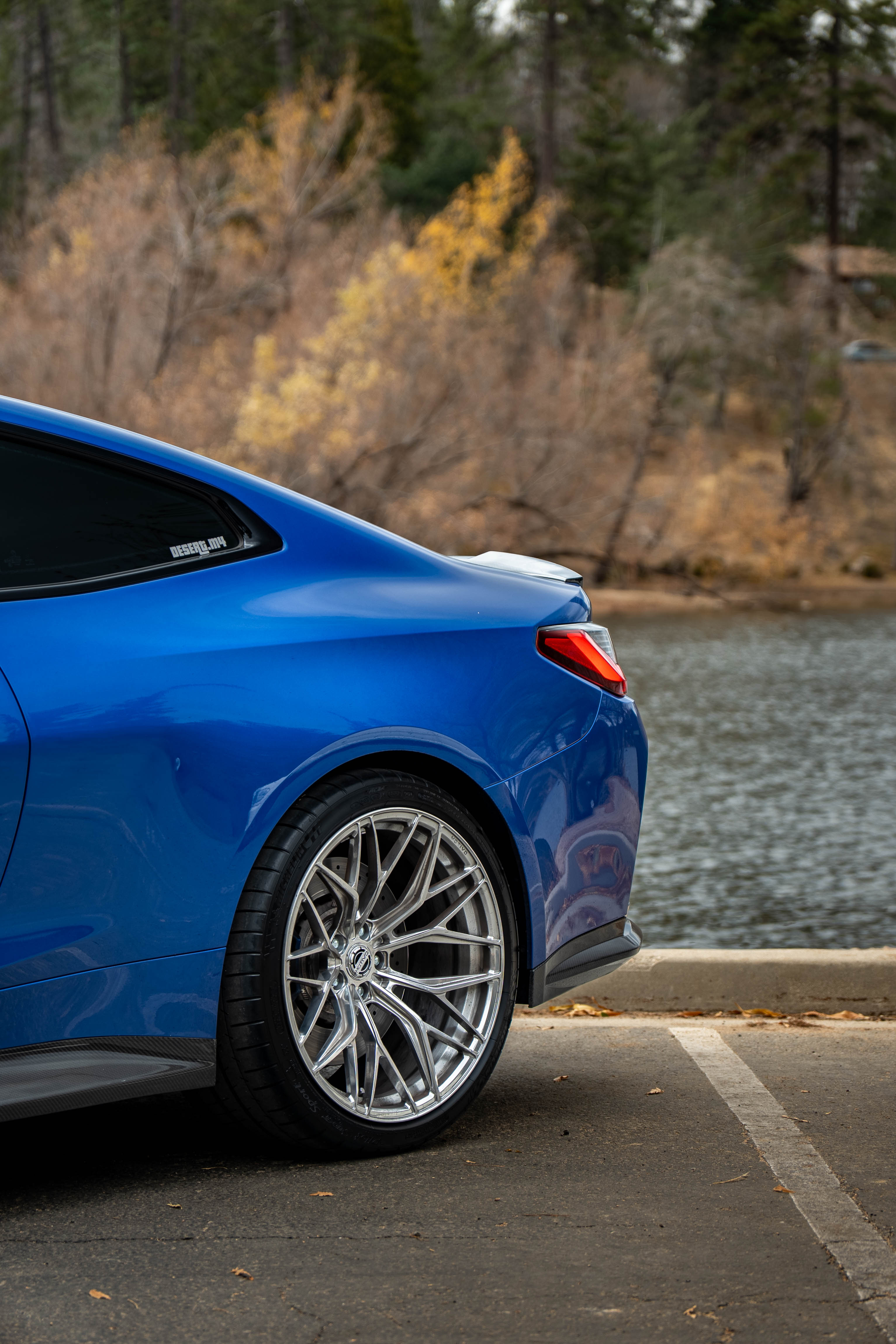 2022 BMW M4 with Motivo Forged MB-E custom wheels in gloss polished clear side view