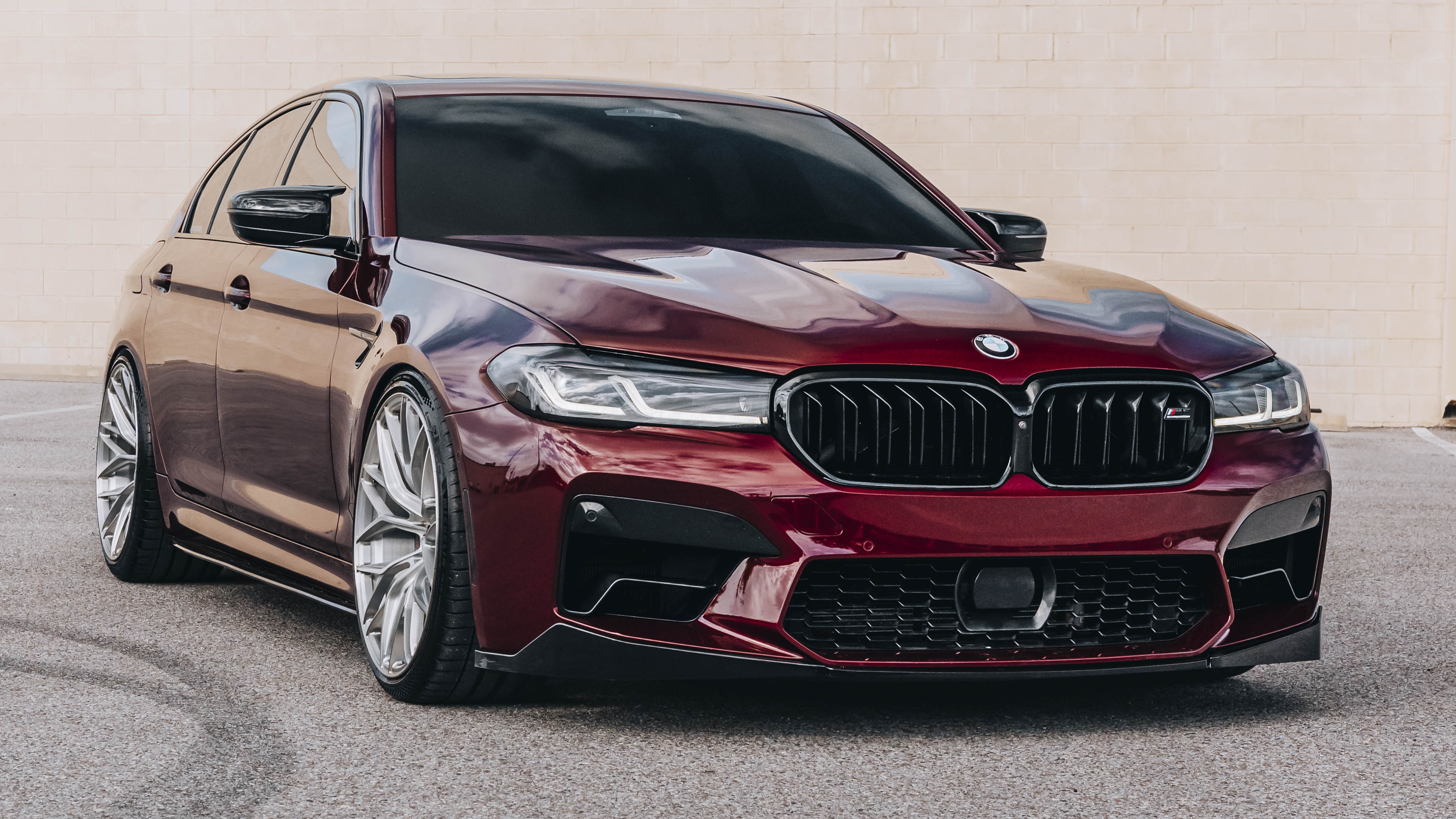 F90 BMW M5 LCI with Motivo Forged MB-E custom wheels in gloss brushed clear finish front side view