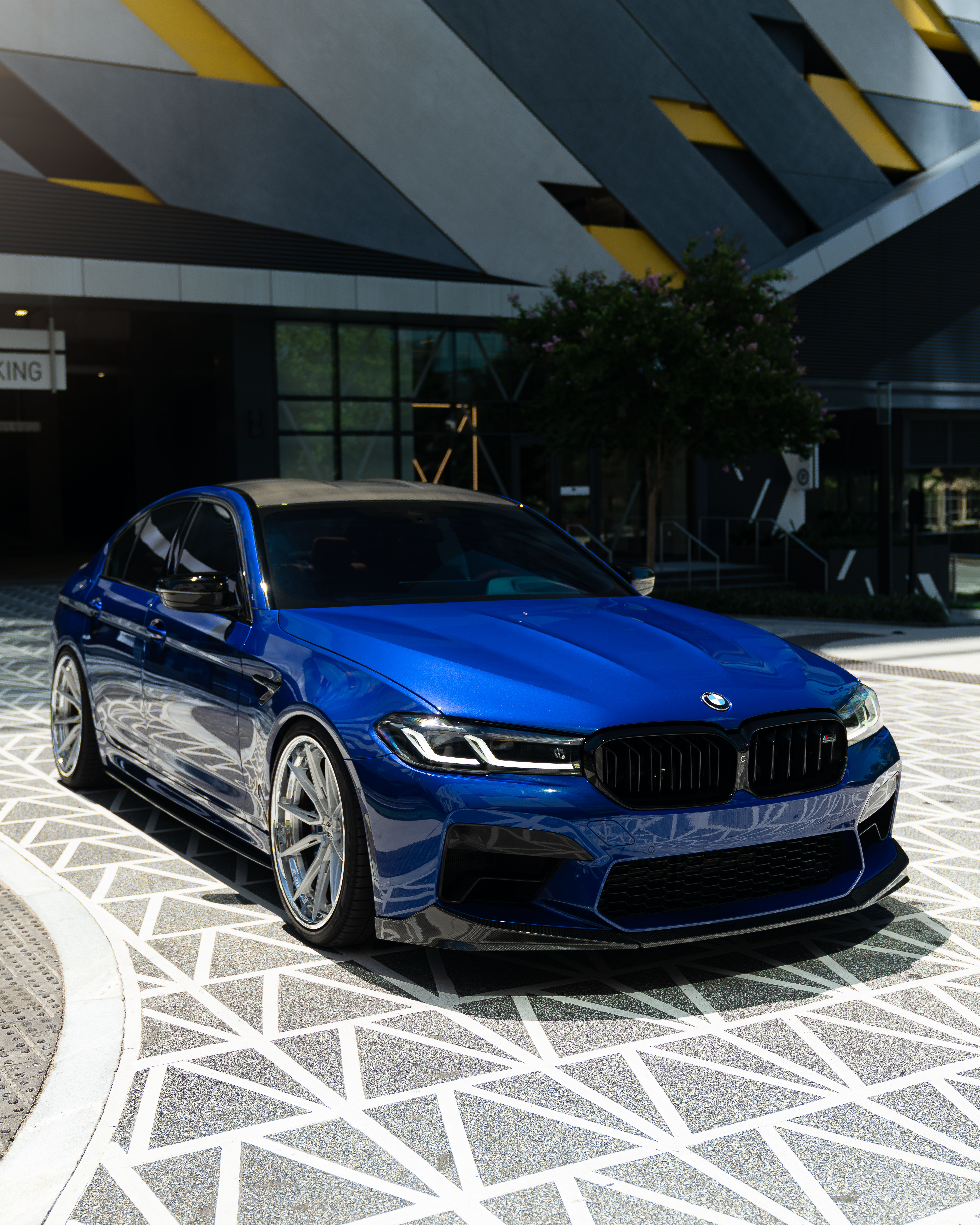 2021 BMW M5 with Motivo Forged CS-R custom wheels in gloss brushed clear and triple chrome side view