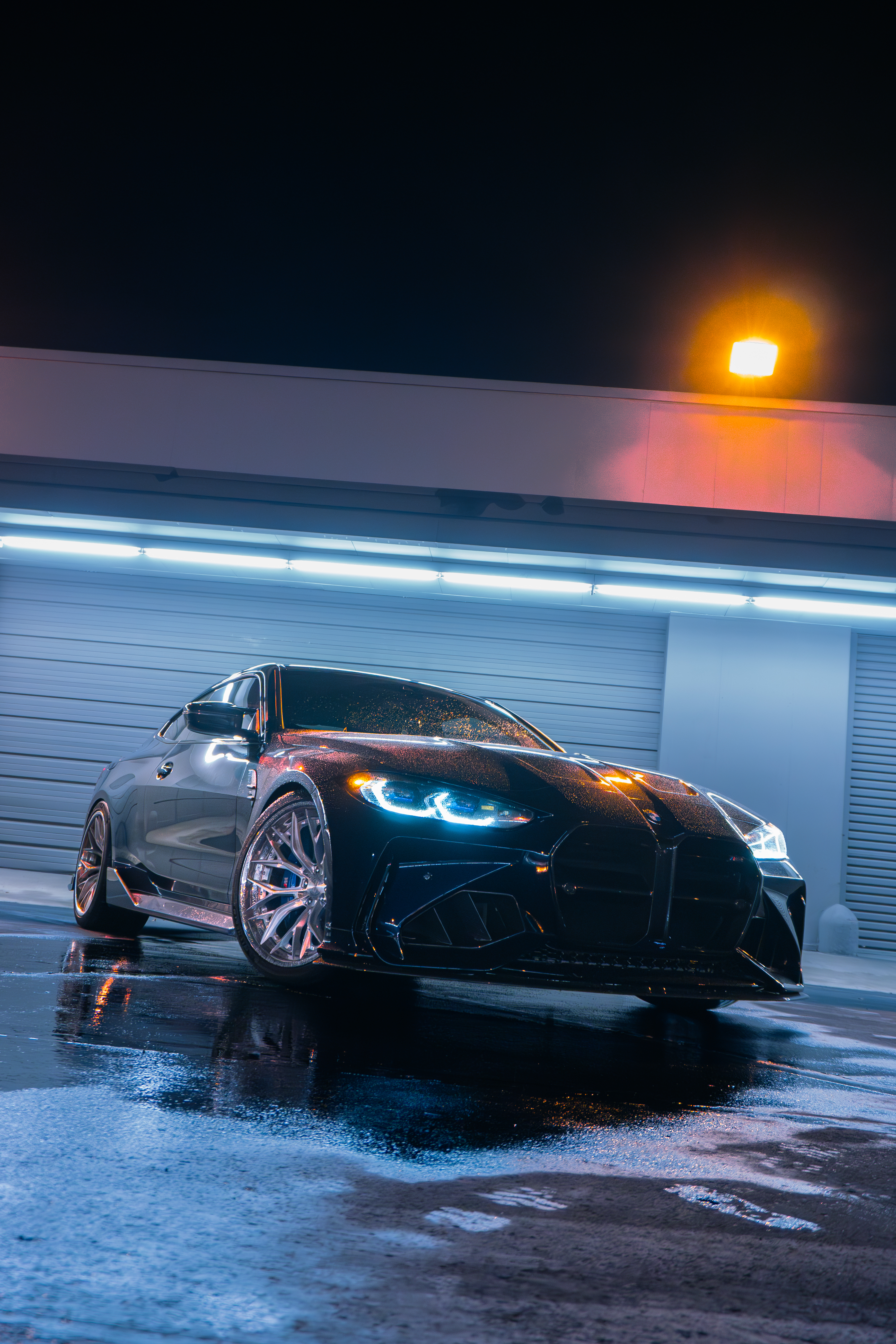 2024 BMW M4 with Motivo Forged CS-J custom wheels in gloss brushed clear and triple chrome side view