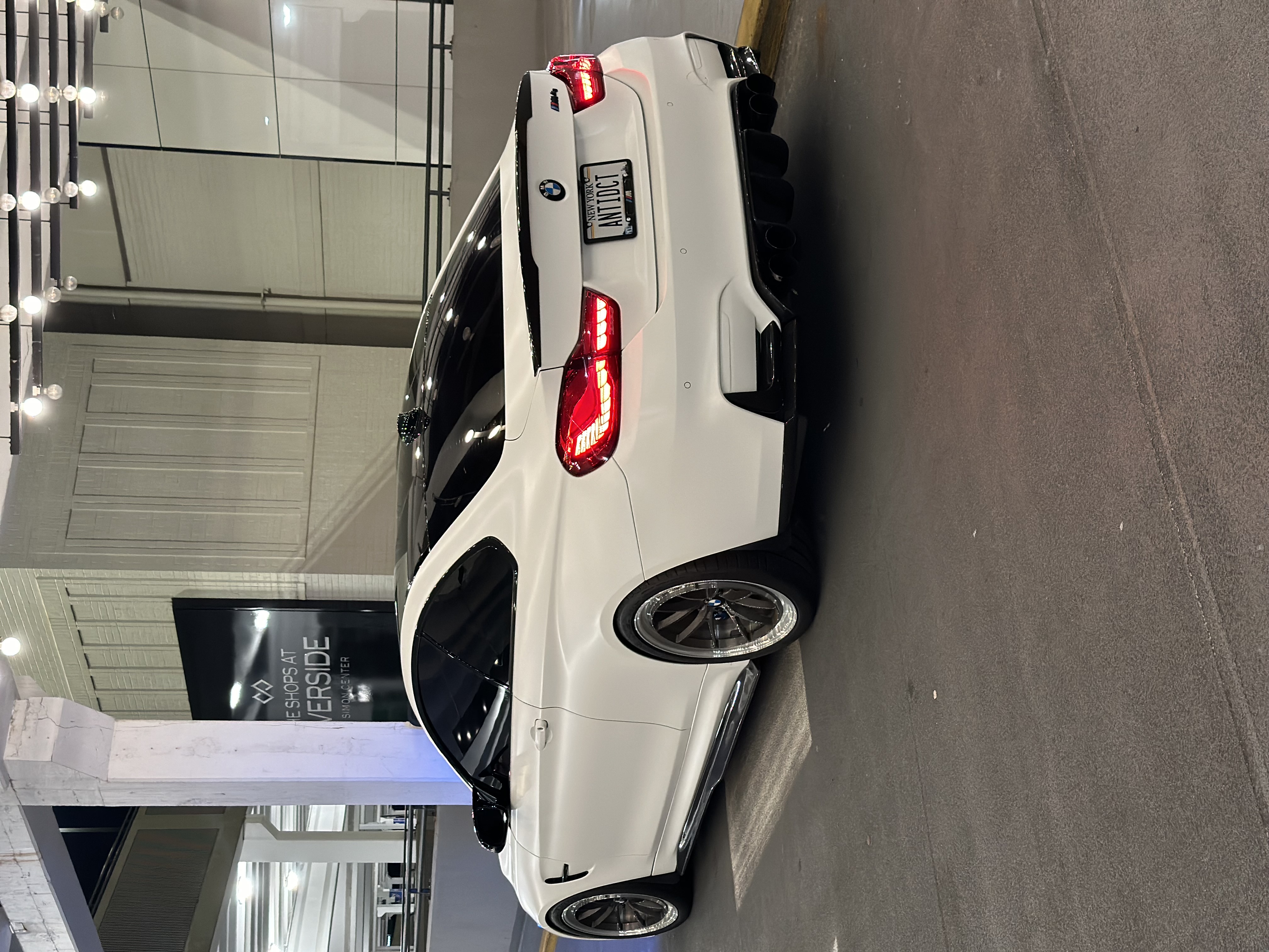 2016 BMW M4 with Motivo Forged MB-C custom wheels in gloss brushed gunmetal and gloss polished clear side view